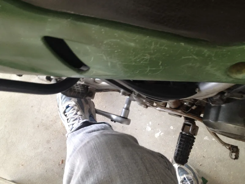Stepping to remove nut